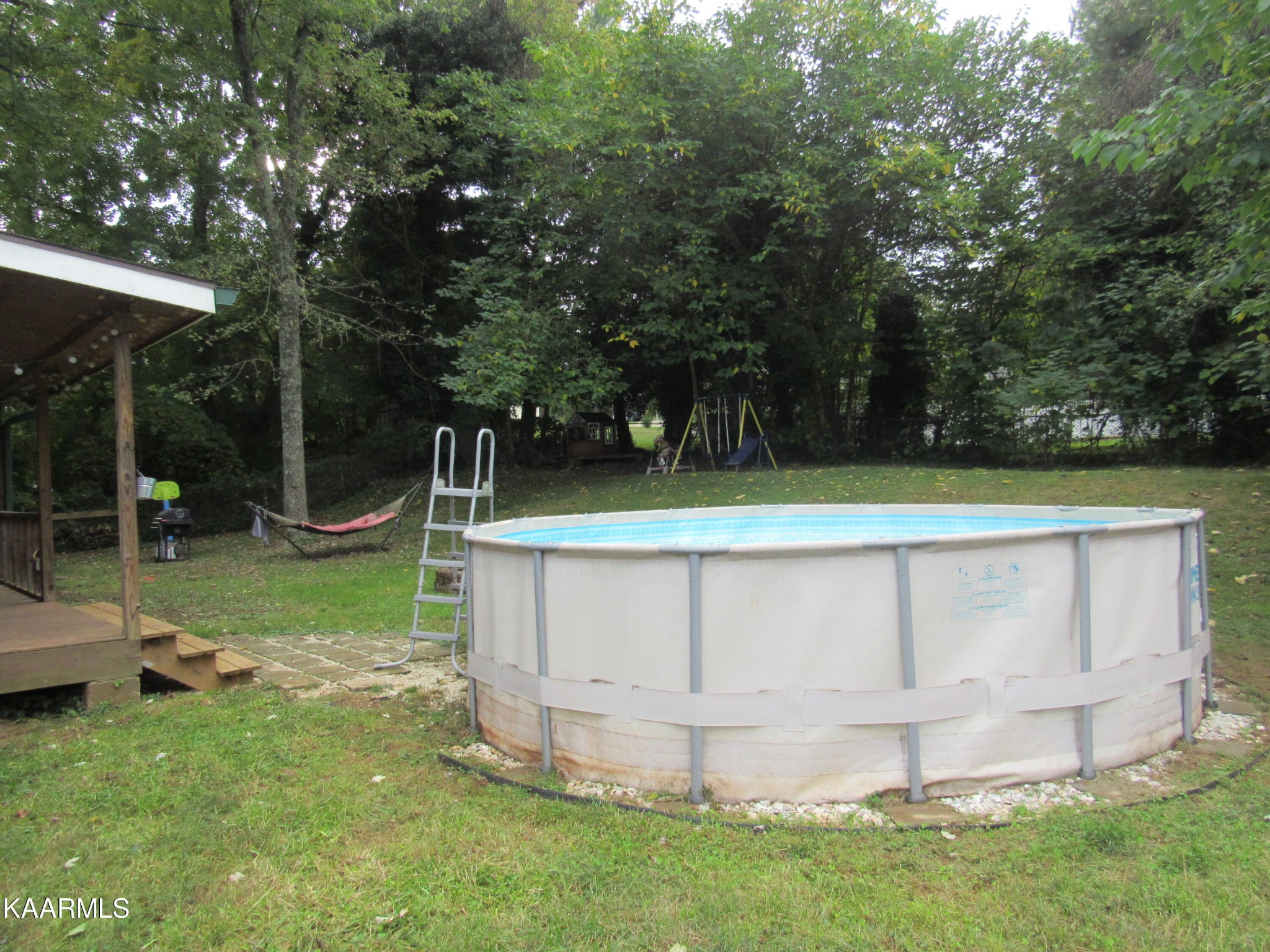 146 Outer Drive Oak Ridge, TN 37830 - Photo 33 of 38 a view of a backyard with a slide