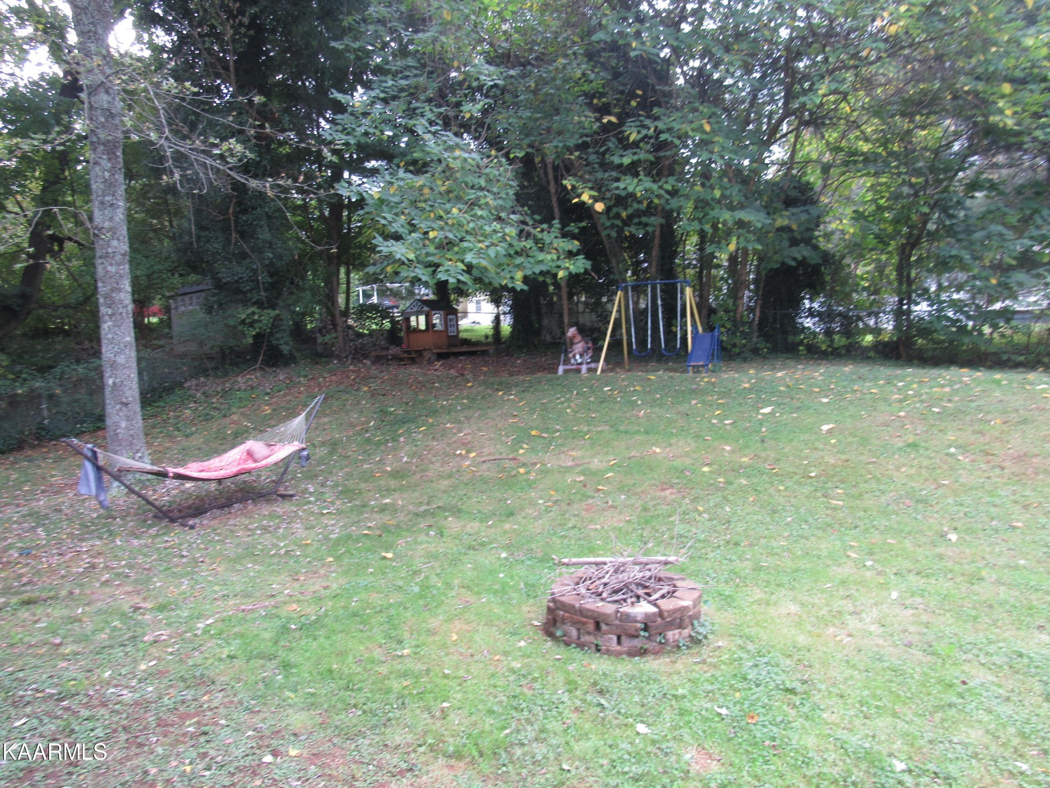 146 Outer Drive Oak Ridge, TN 37830 - Photo 36 of 38 a backyard of a house with lots of green space
