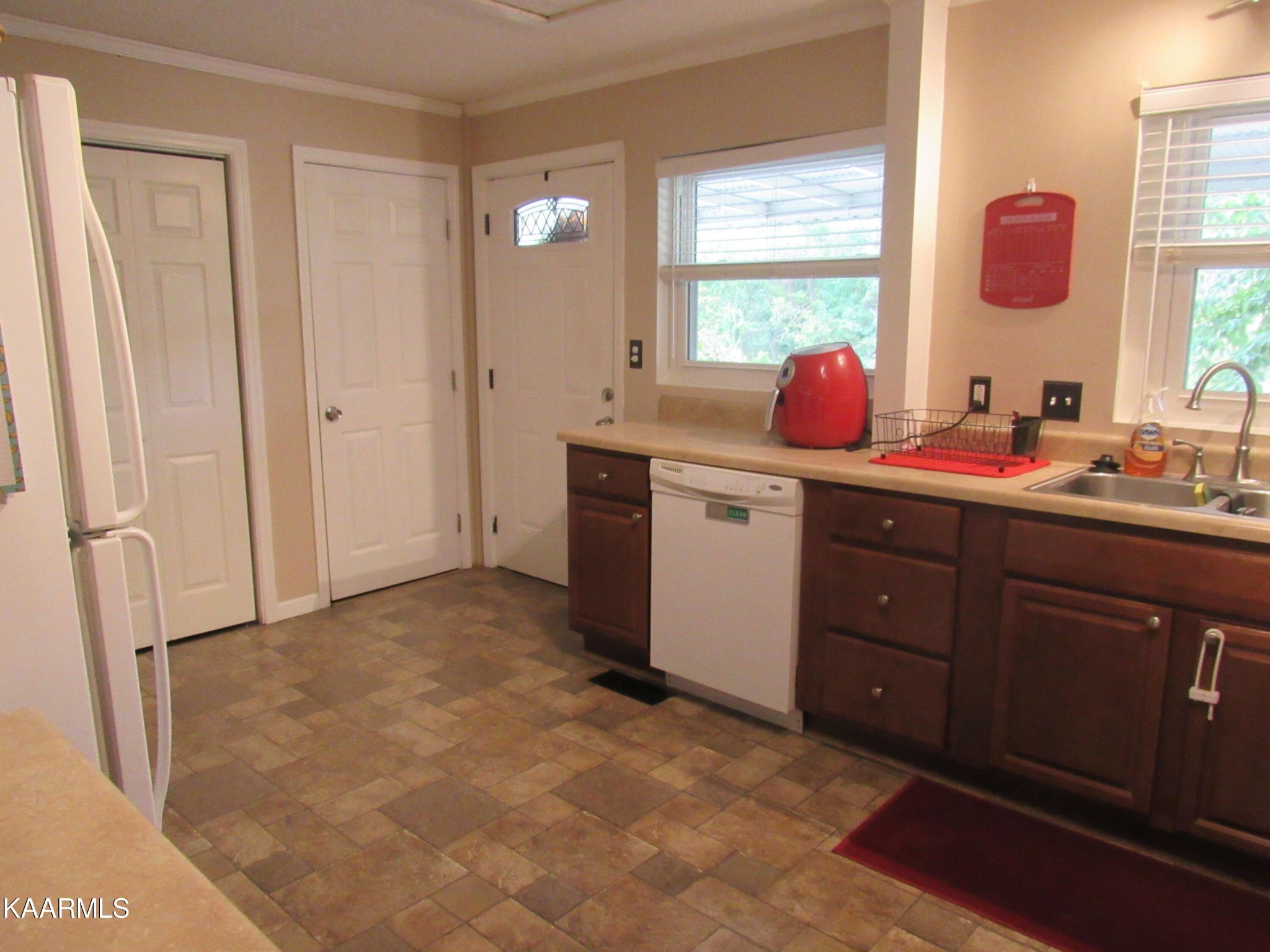 146 Outer Drive Oak Ridge, TN 37830 - Photo 10 of 38 a kitchen with a sink cabinets and window