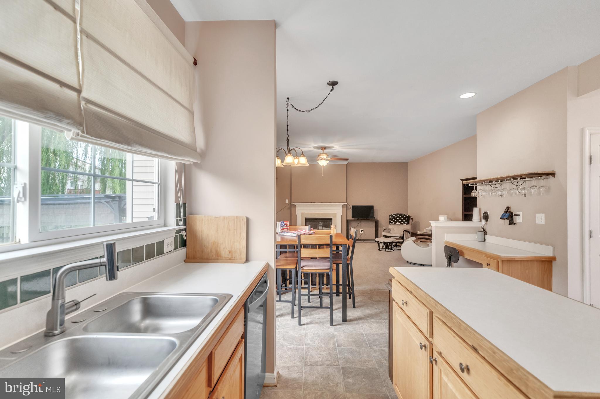 9879 Upper Mill Loop Bristow, VA 20136 - Photo 13 of 32 Double sink w/ disposal & new faucet, rec. lights
