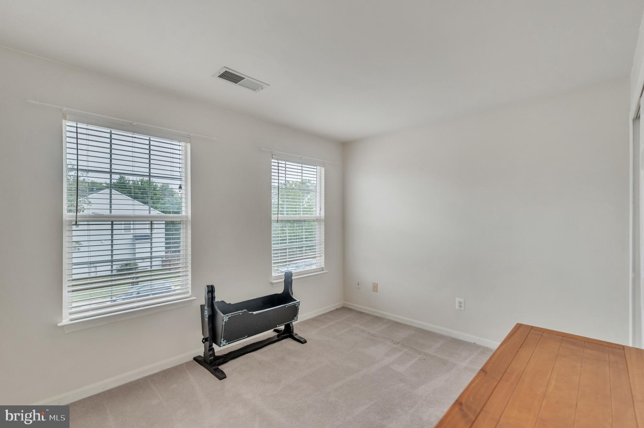 9879 Upper Mill Loop Bristow, VA 20136 - Photo 16 of 32 13x10 BR w/ carpet & double closet