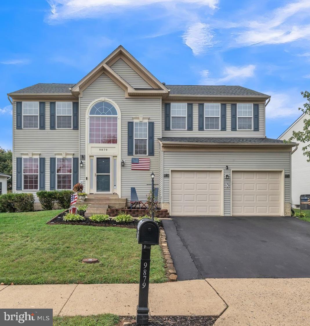 9879 Upper Mill Loop Bristow, VA 20136 - Photo 2 of 32 19x19 2 car garage with door openers