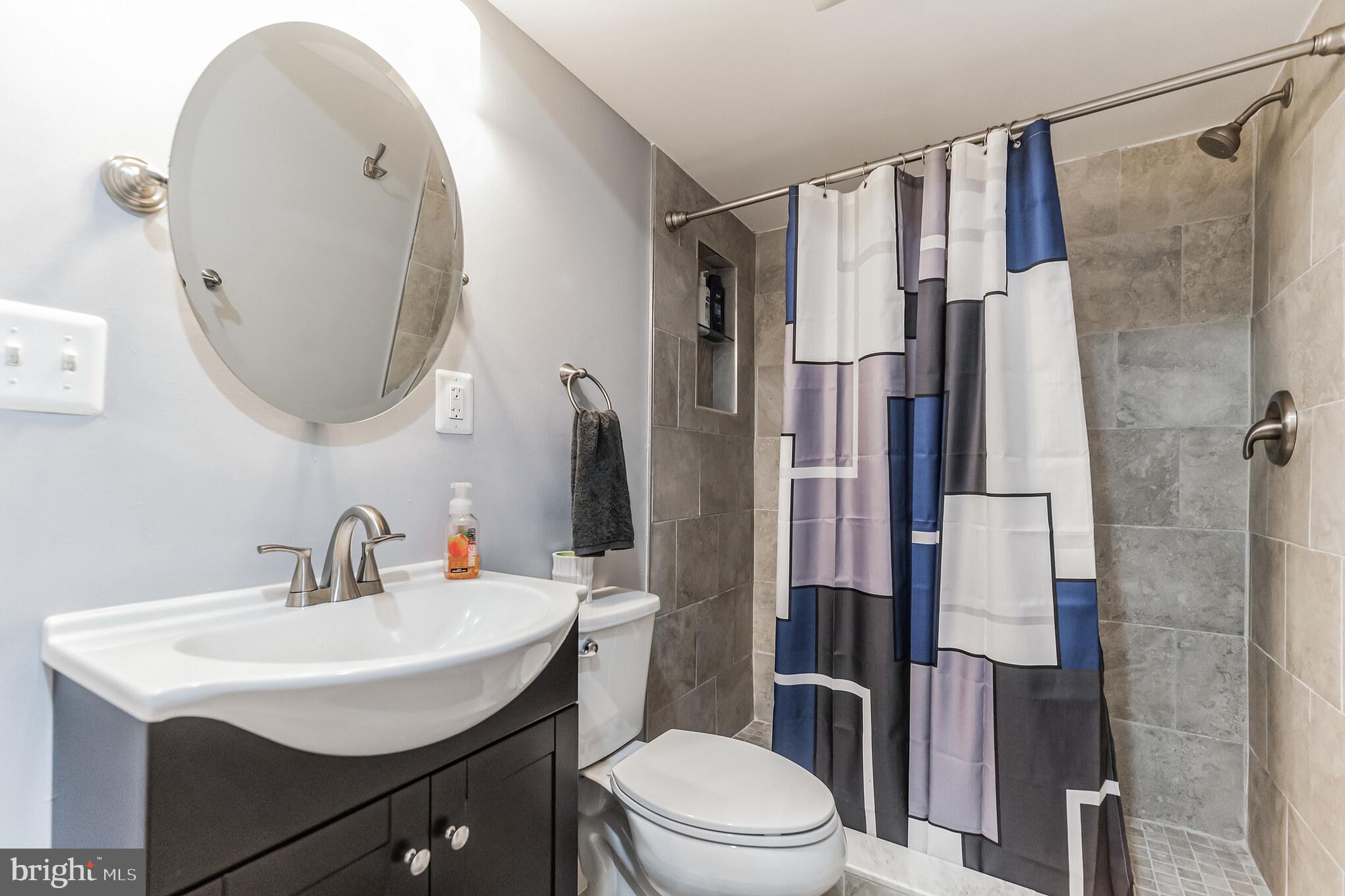 9879 Upper Mill Loop Bristow, VA 20136 - Photo 28 of 32 Full bath w/custom tile shwr, cer. tile floor