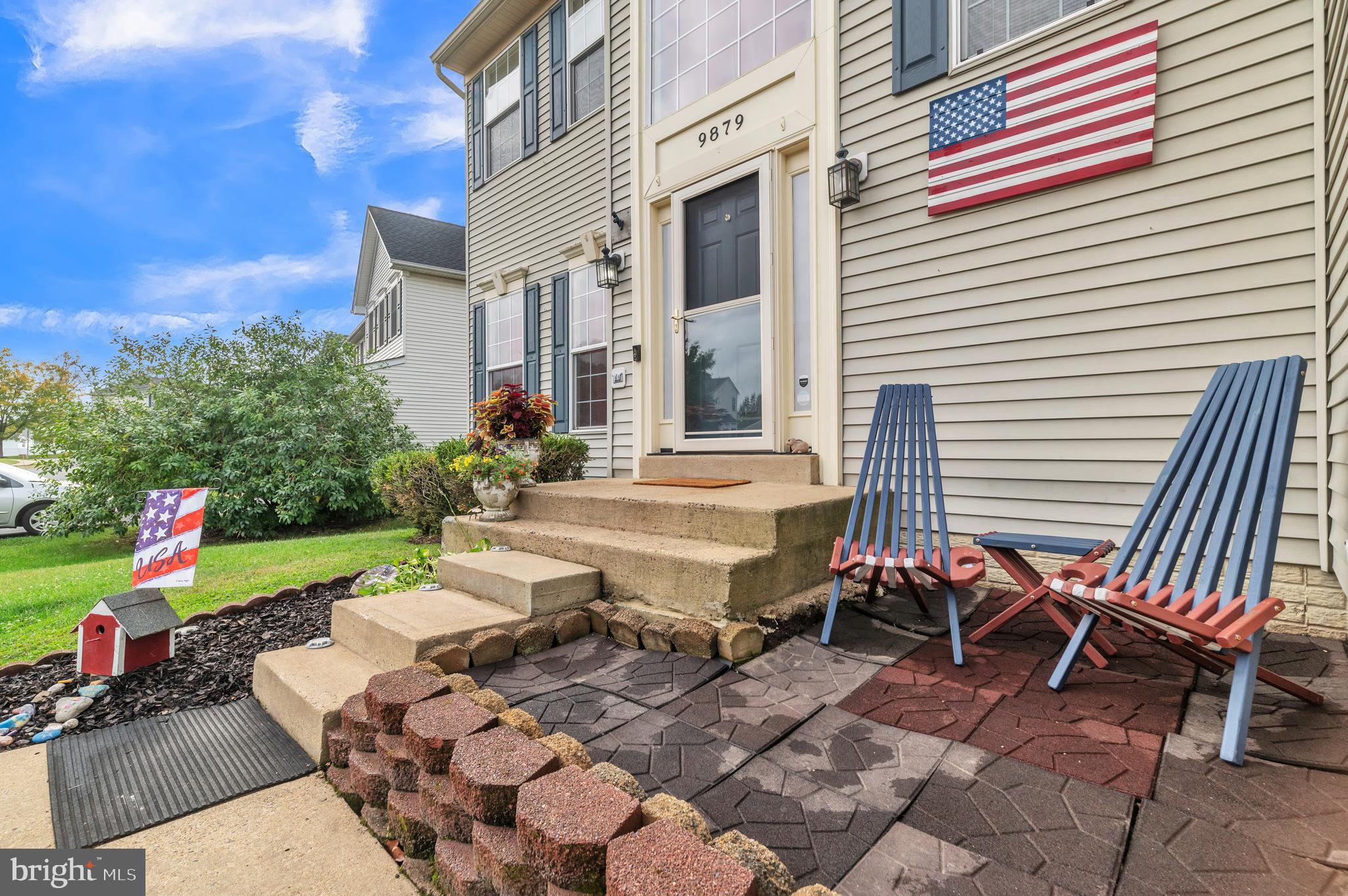 9879 Upper Mill Loop Bristow, VA 20136 - Photo 4 of 32 Concrete walkway to front entrance, storm door