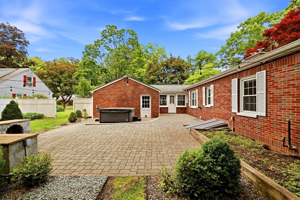 130 Connecticut Avenue Springfield, MA 01107 - Photo 10 of 40 a front view of a house with a yard and a garage