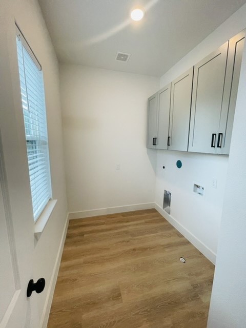 5312 Denmark Street Houston, TX 77028 - Photo 11 of 16 a view of an empty room with cabinet and window