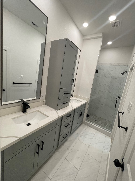 5312 Denmark Street Houston, TX 77028 - Photo 15 of 16 a bathroom with a sink and mirror