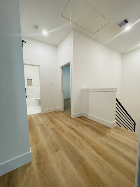 5312 Denmark Street Houston, TX 77028 - Photo 7 of 16 a view of empty room with wooden floor