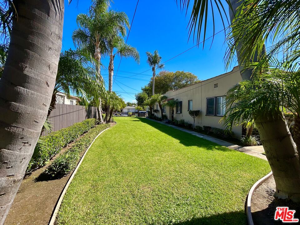 1041 Gulf Avenue Wilmington, CA 90744 - Photo 3 of 12 a view of swimming pool with a garden