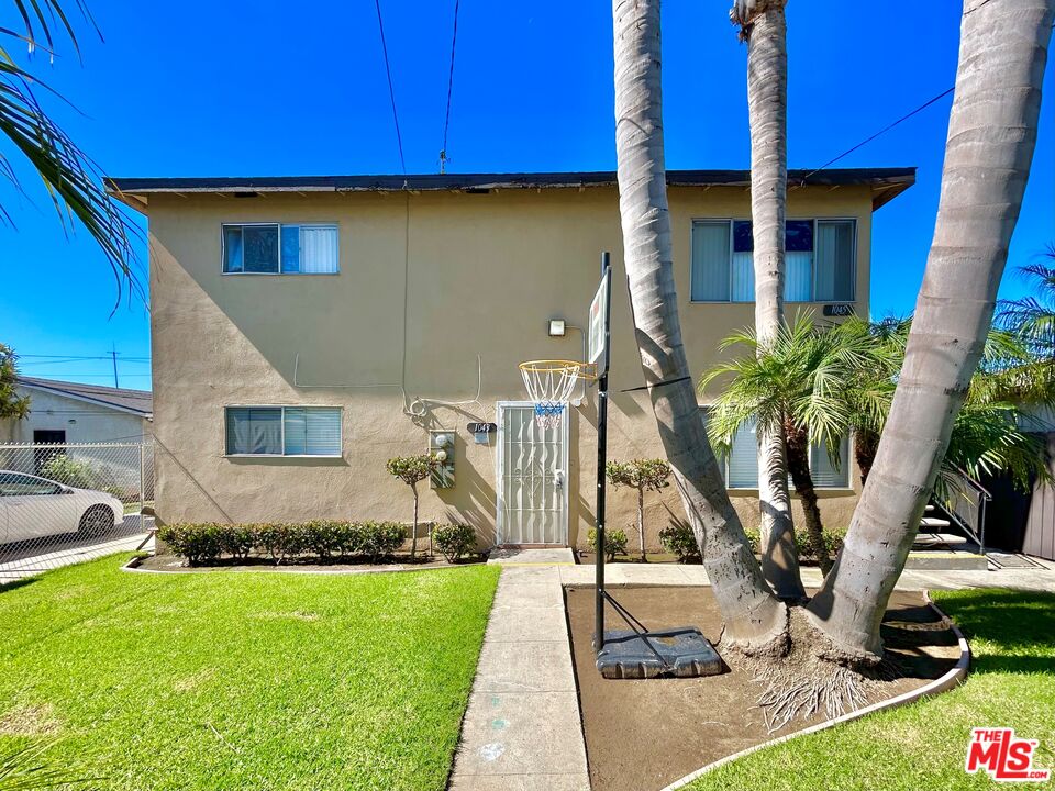 1041 Gulf Avenue Wilmington, CA 90744 - Photo 4 of 12 a front view of house with yard