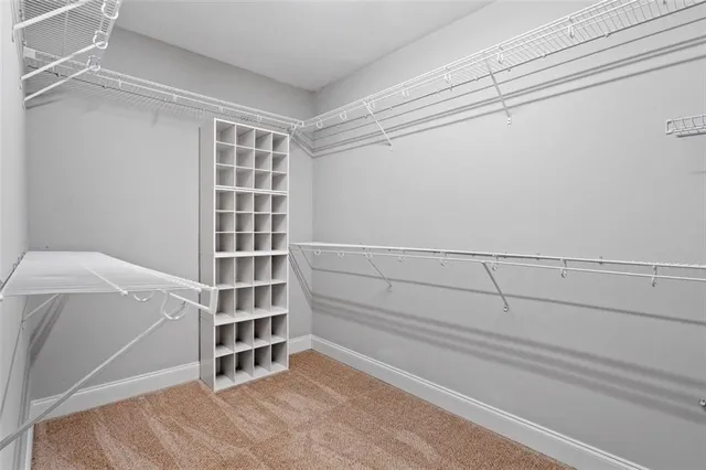 a view of an empty walk in closet