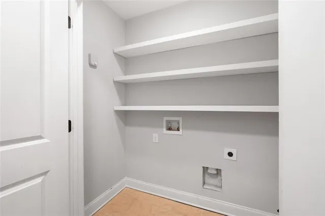 a view of an empty walk in closet