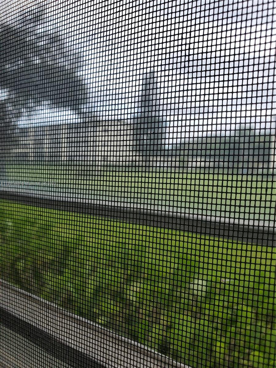 550 Mansfield M, Unit 550 Boca Raton, FL 33434 - Photo 12 of 14 a view of a brick wall