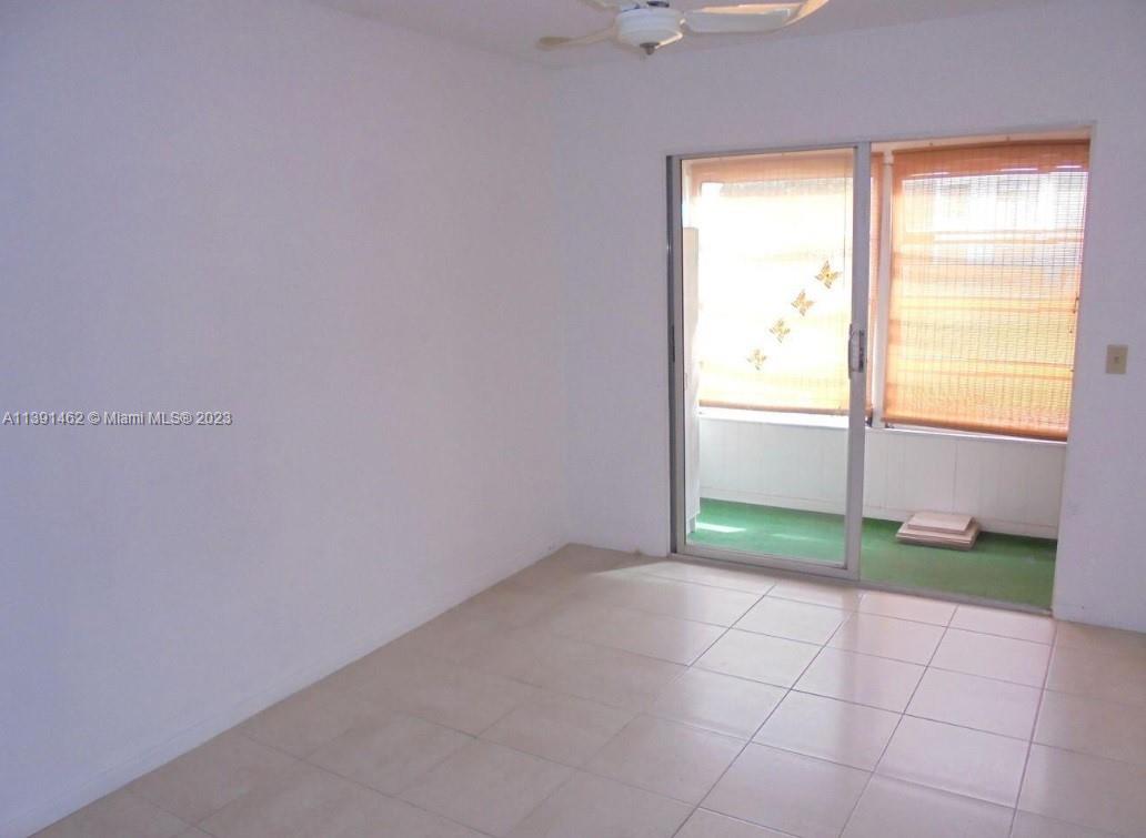 550 Mansfield M, Unit 550 Boca Raton, FL 33434 - Photo 7 of 14 an empty room with a window
