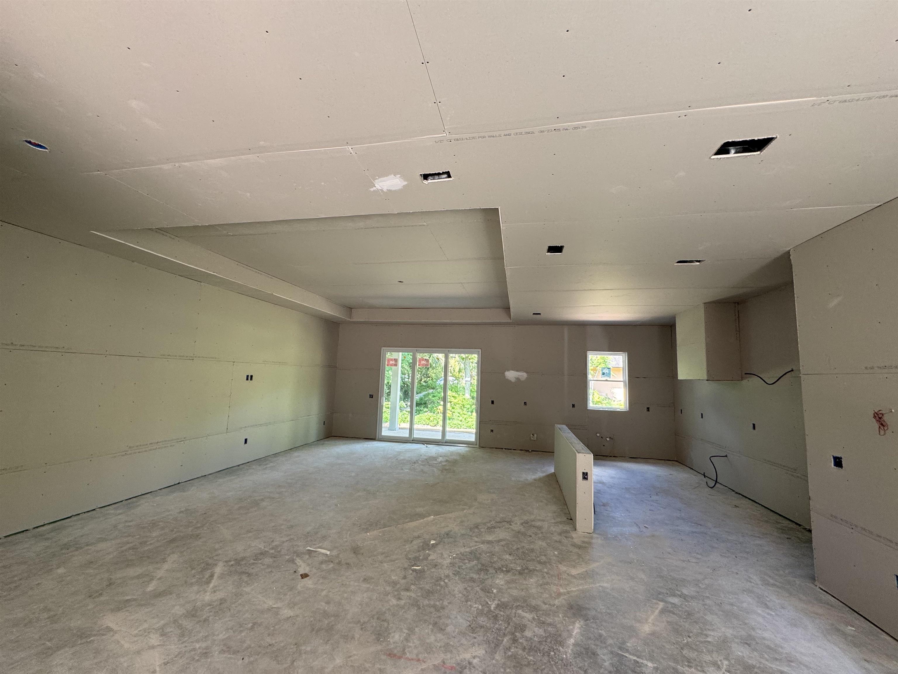 16 Baru Road St. Augustine, FL 32080 - Photo 2 of 10 an empty room with windows and entrance