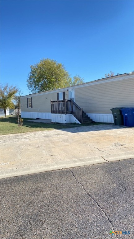 a view of a swimming pool and an outdoor seating