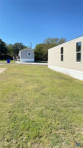 a view of outdoor space and yard