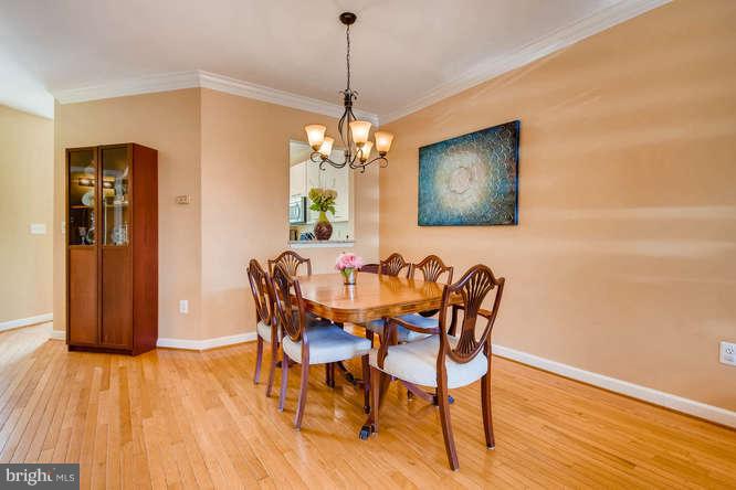 109 Lancefield Road Baltimore, MD 21209 - Photo 8 of 30 DINING ROOM W/ WOOD FLOORS