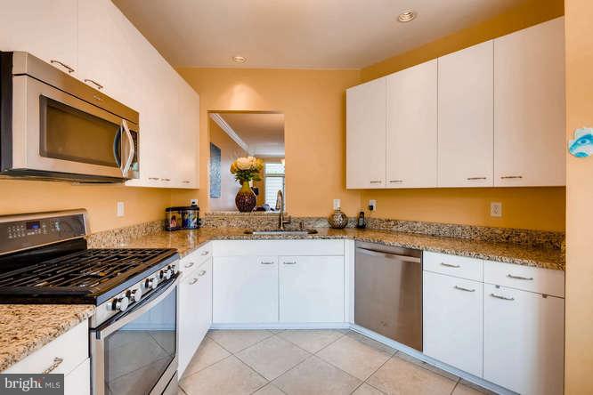 109 Lancefield Road Baltimore, MD 21209 - Photo 10 of 30 GRANITE KITCHEN W/ PASS THRU TO DINING RM