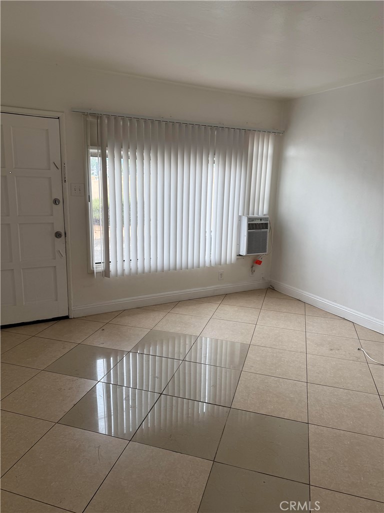 12102 Preston Street Grand Terrace, CA 92313 - Photo 14 of 20 an empty room with windows