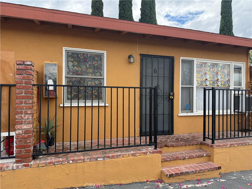 12102 Preston Street Grand Terrace, CA 92313 - Photo 3 of 20 a view of a house with a small backyard