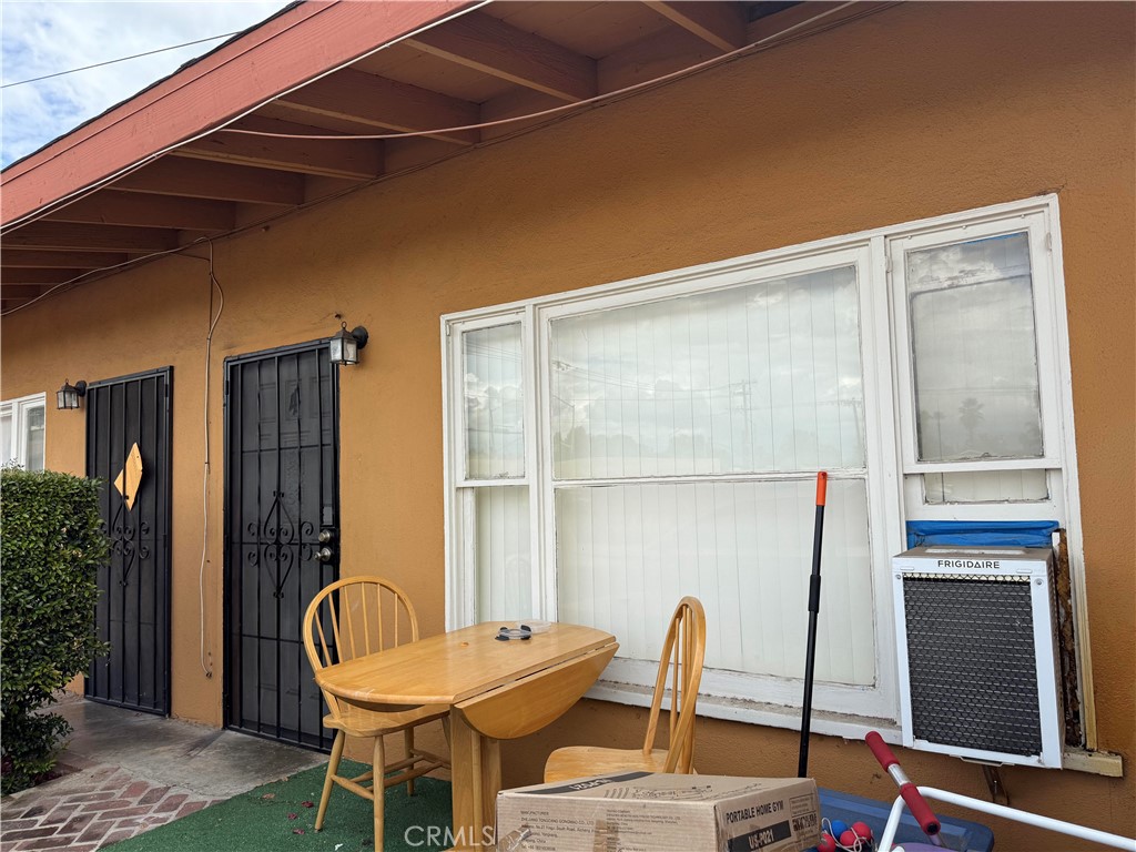 12102 Preston Street Grand Terrace, CA 92313 - Photo 5 of 20 a backyard of a house with table and chairs