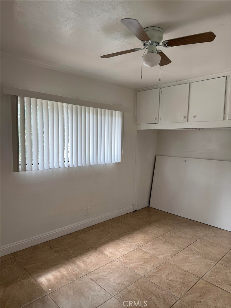 12102 Preston Street Grand Terrace, CA 92313 - Photo 10 of 20 a view of an empty room with a window