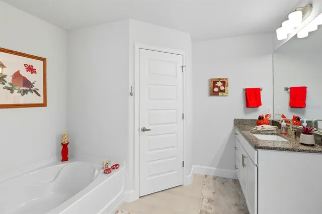 a bathroom with a sink and a bathtub