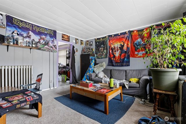 a room with furniture and a flat screen tv