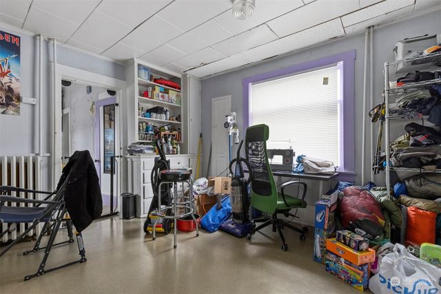 a utility room with sink dryer and washer