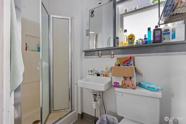 a city street lined with buildings and cars