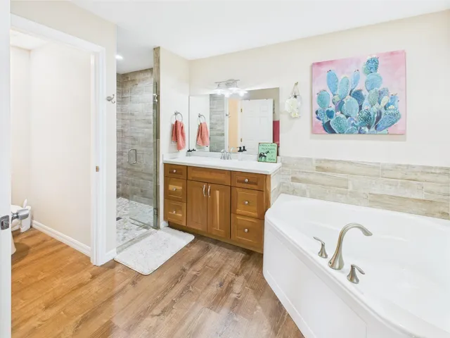 a view of a golf course with a lake