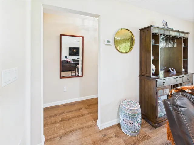 a view of house with a yard