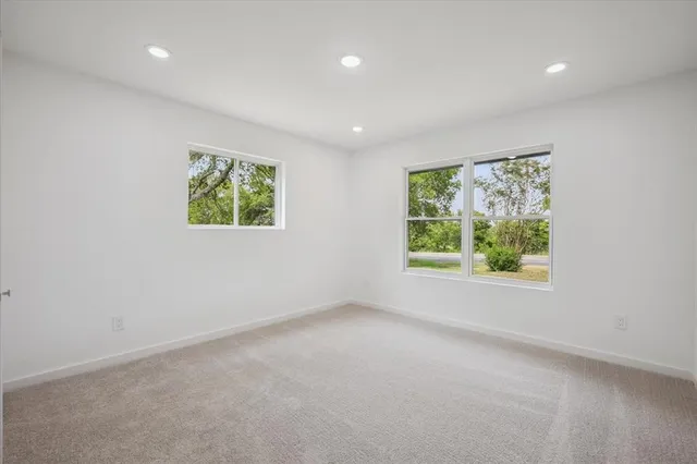 an empty room with windows