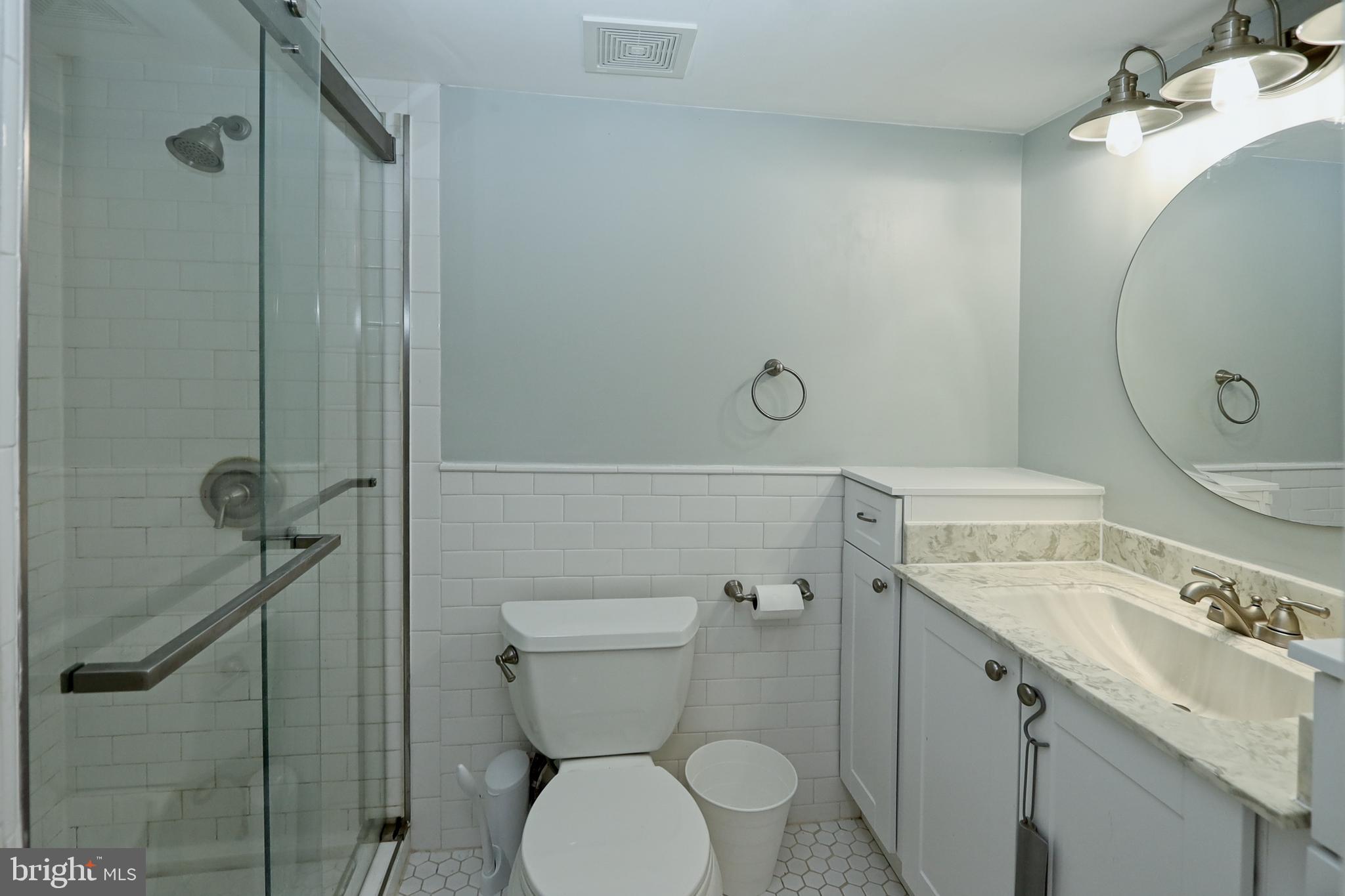 2104 Green Watch Way, Unit 301 Reston, VA 20191 - Photo 11 of 33 Fully renovated primary bathroom