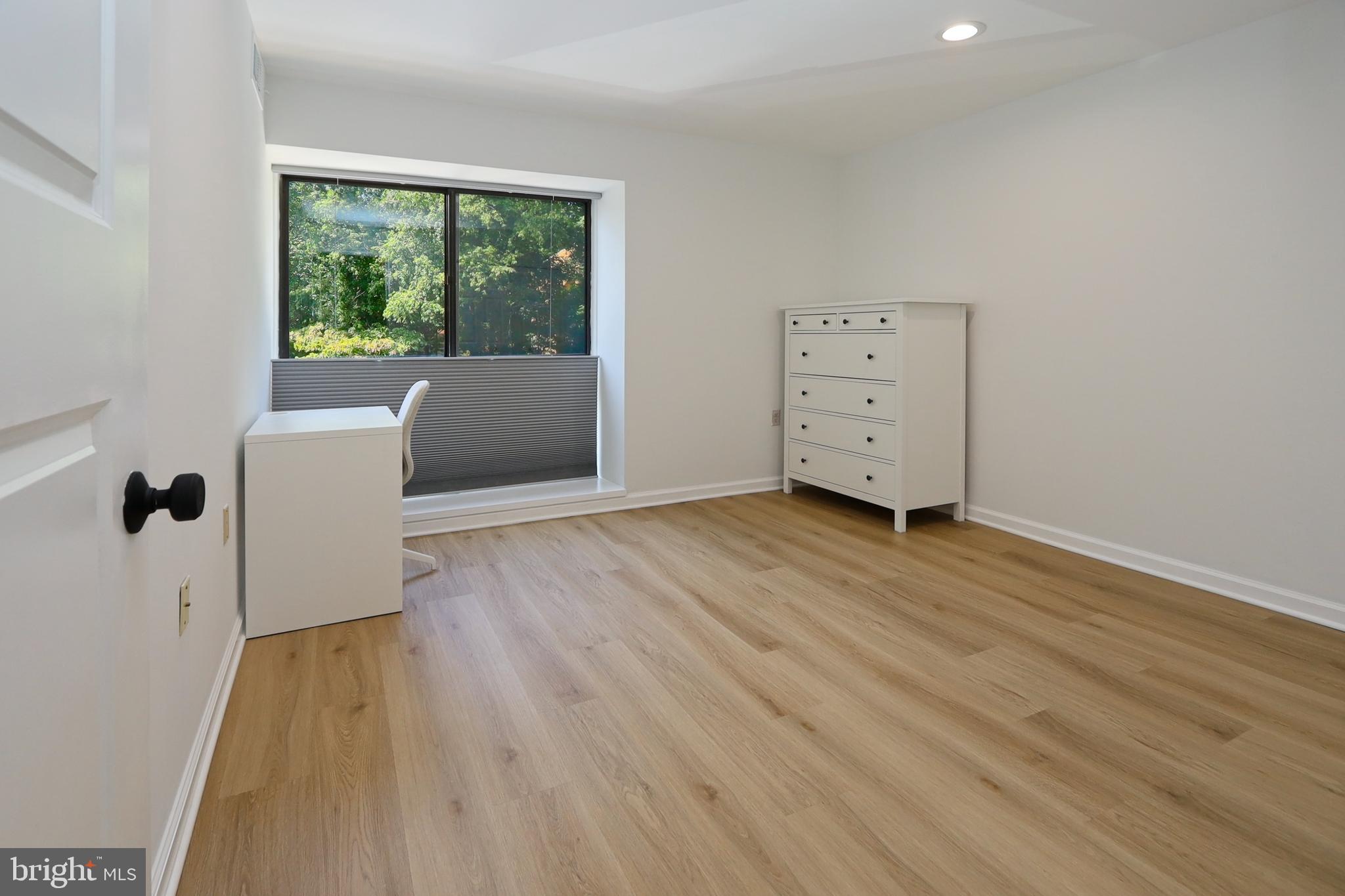 2104 Green Watch Way, Unit 301 Reston, VA 20191 - Photo 14 of 33 Bedroom 2 also features flr-to-ceiling windows