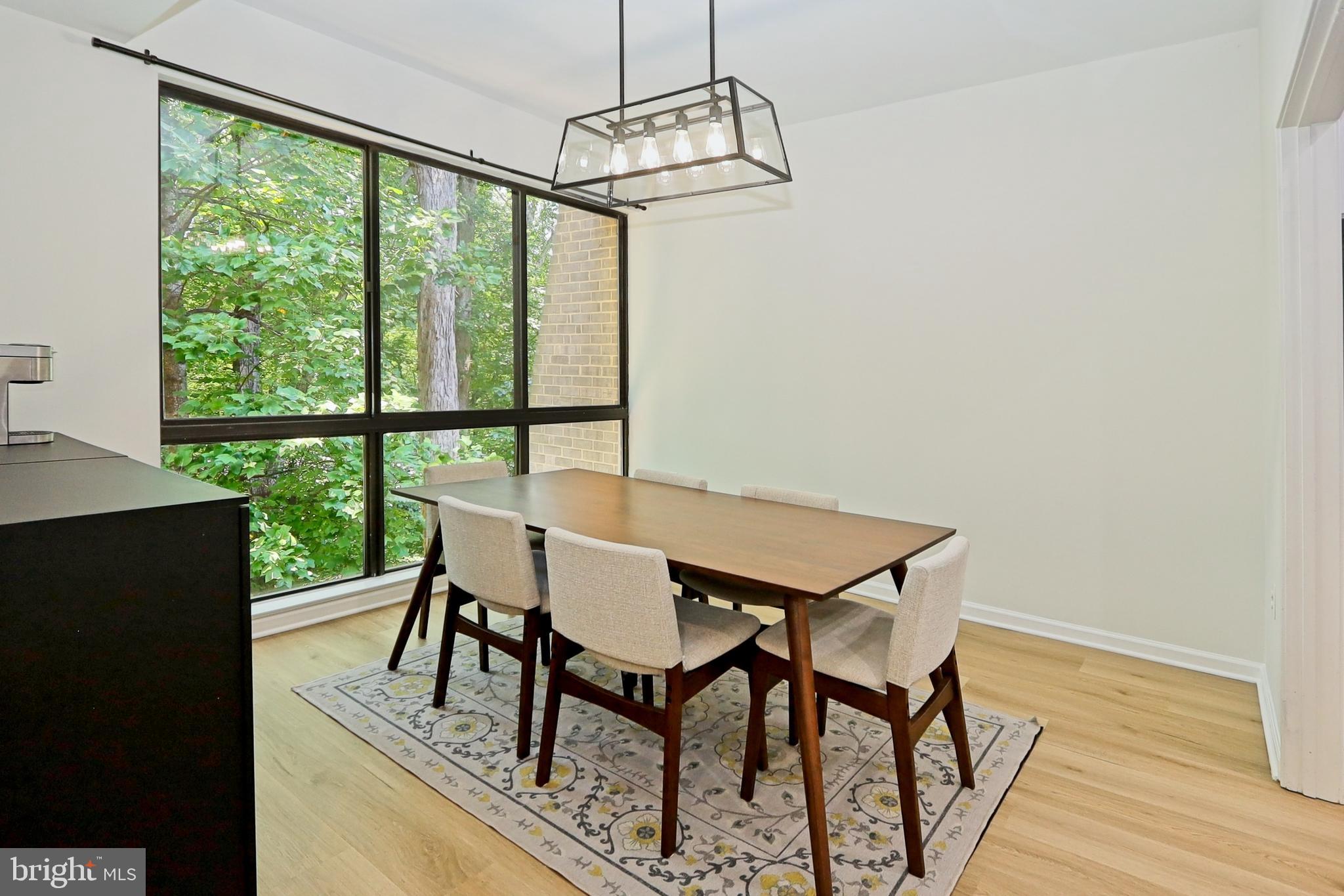2104 Green Watch Way, Unit 301 Reston, VA 20191 - Photo 6 of 33 Great wooded views from the dining room