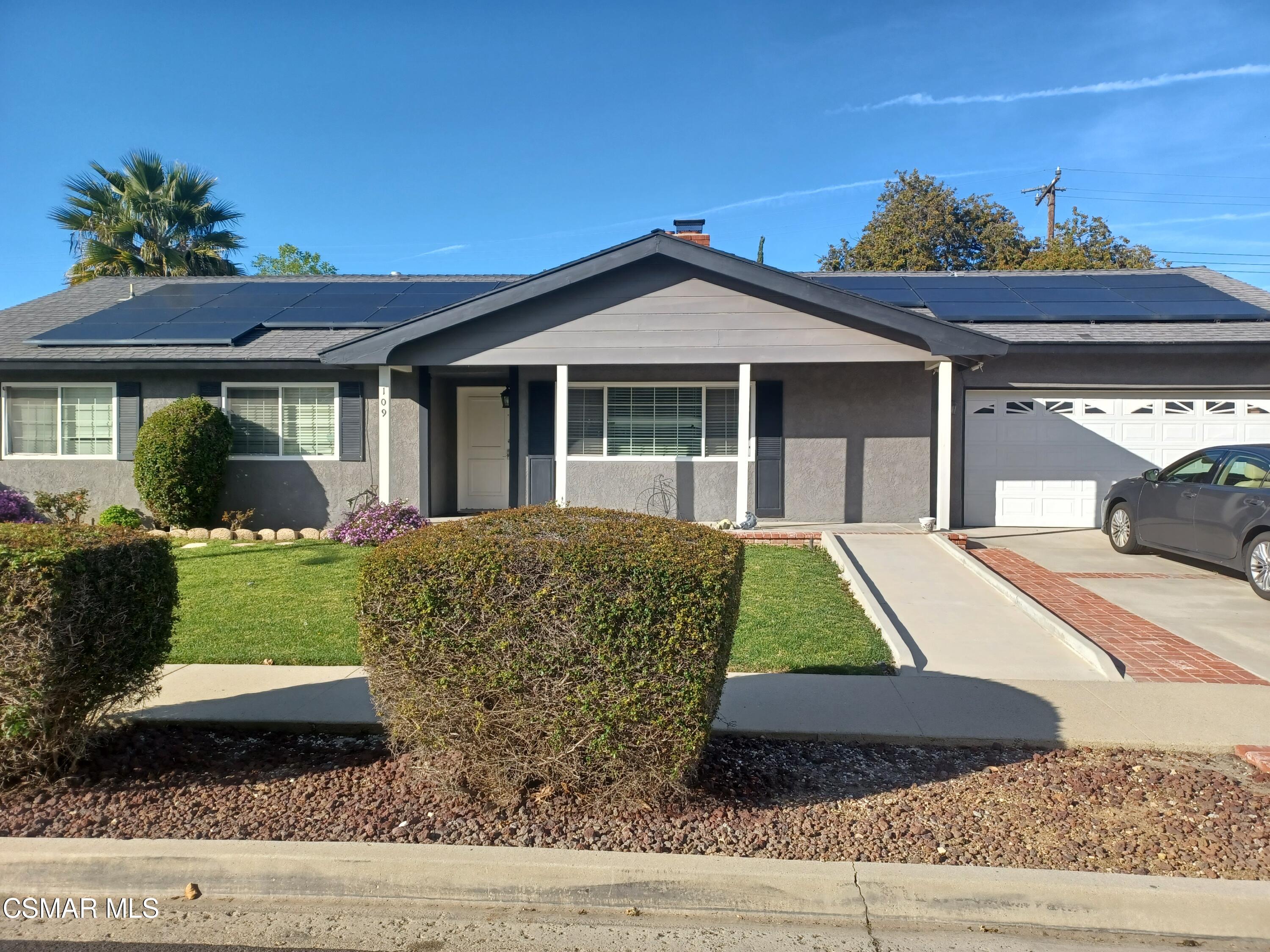 a view of outdoor space yard and front view of a house