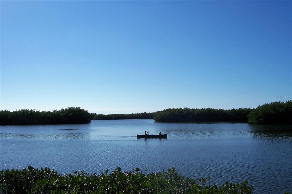 1709 Pelican Cove Road, Unit GL446 Sarasota, FL 34231 - Photo 25 of 25 a view of lake and mountain