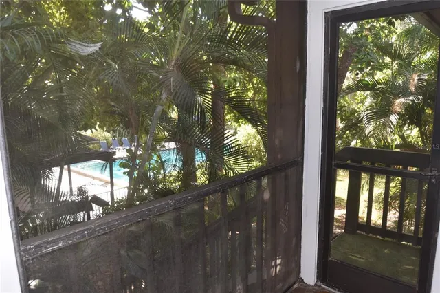 a view of a house with a tree