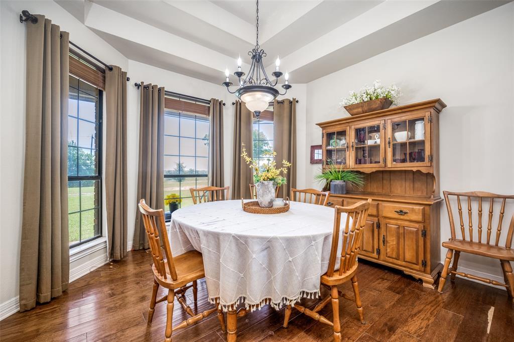 778 County Road 3141 Decatur, TX 76234 - Photo 6 of 25 a view of a dining room with furniture window and wooden floor