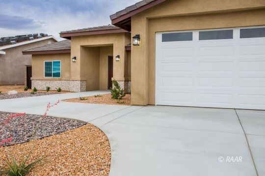 1124 Marbella Drive Ridgecrest, CA 93555 - Photo 5 of 14 a view of a house with a terrace