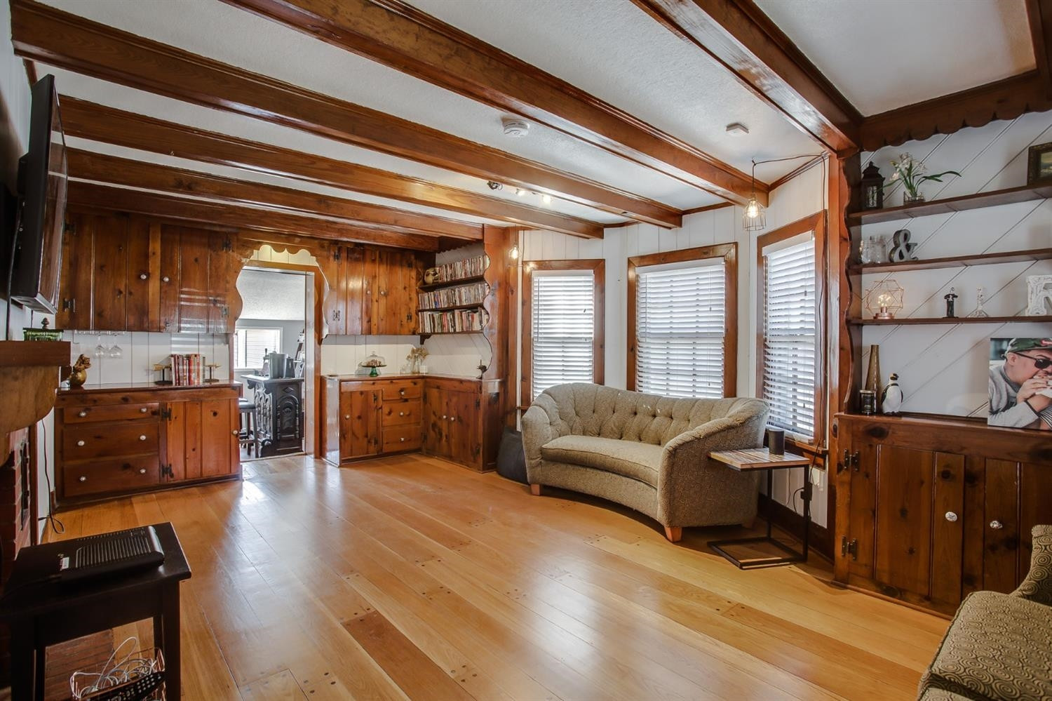 2515 25th Street Lubbock, TX 79410 - Photo 2 of 16 a living room with furniture and a flat screen tv