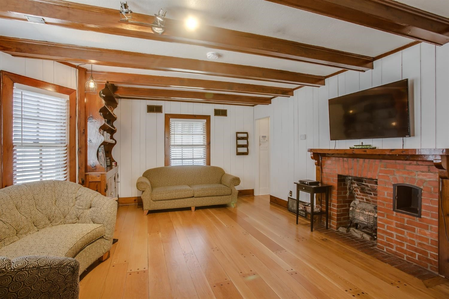 2515 25th Street Lubbock, TX 79410 - Photo 3 of 16 a living room with furniture and a flat screen tv