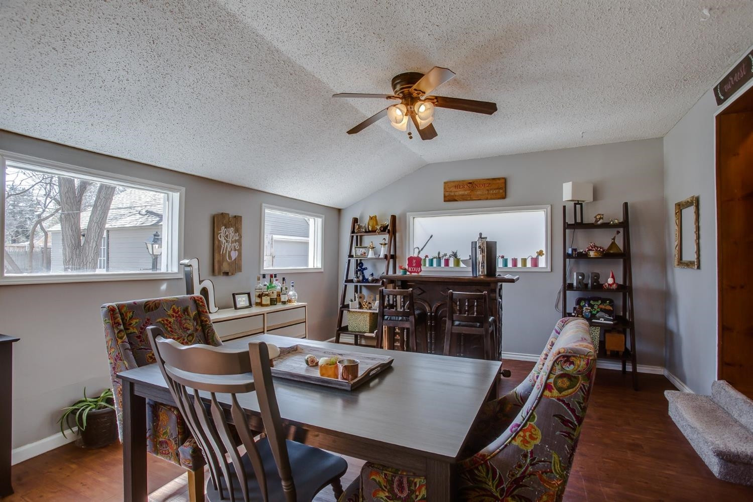 2515 25th Street Lubbock, TX 79410 - Photo 6 of 16 a living room with furniture and a flat screen tv