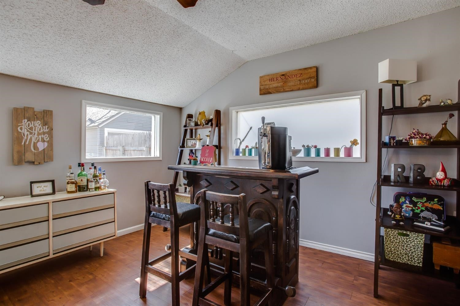 2515 25th Street Lubbock, TX 79410 - Photo 10 of 16 a view of a dining room with furniture and wooden floor