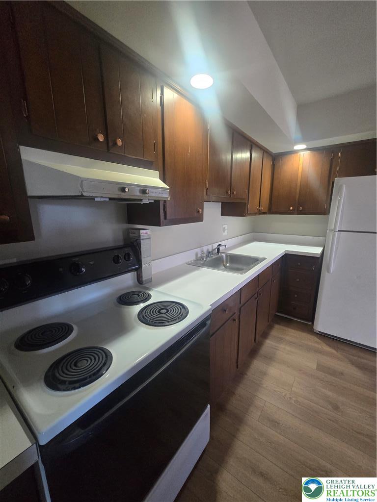 188 Jefferson Street, Unit 2 Emmaus, PA 18049 - Photo 7 of 9 a kitchen with a stove and a sink