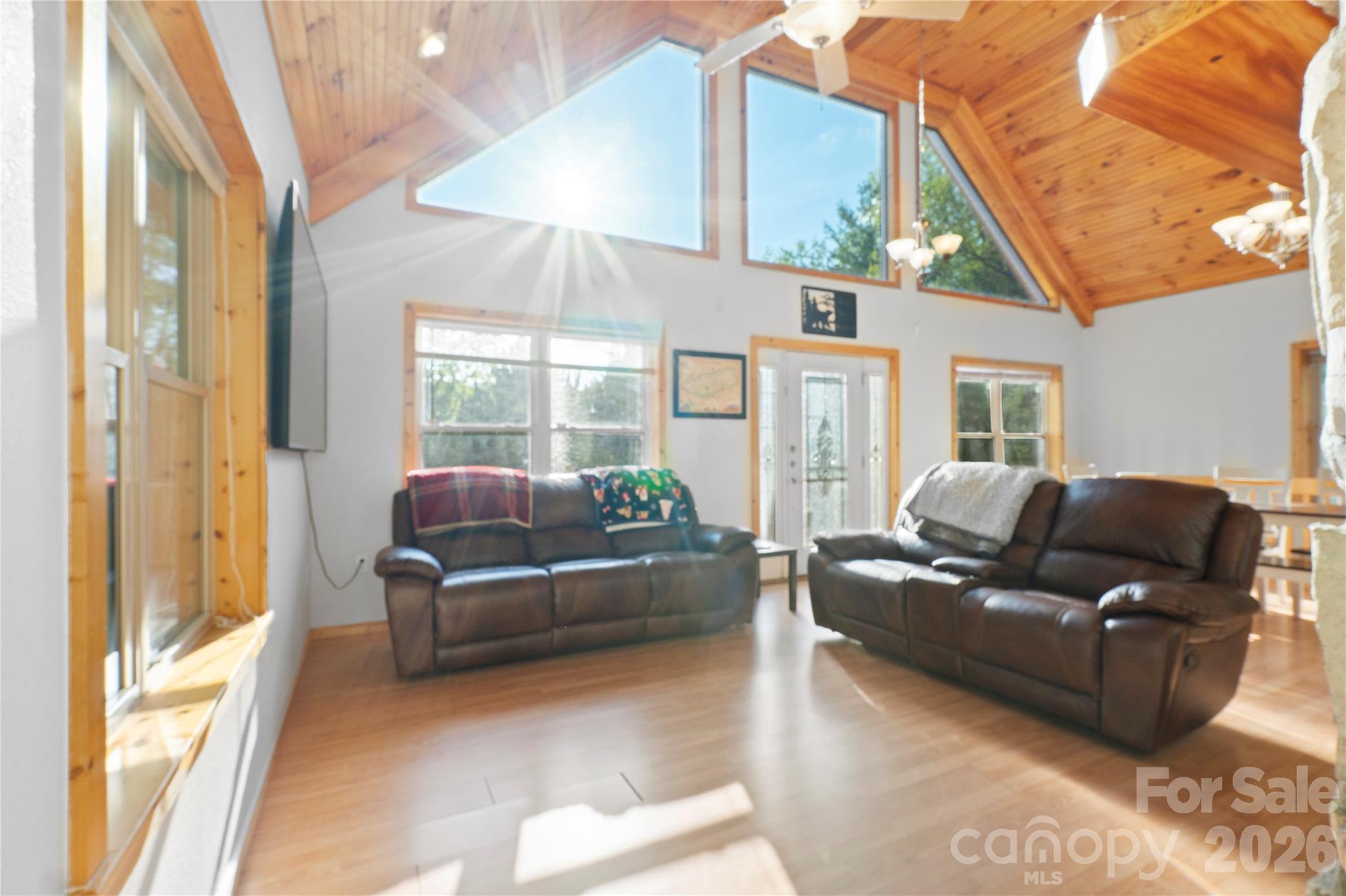 273 North Rhododendron Road Almond, NC 28702 - Photo 14 of 27 a living room with furniture and a large window