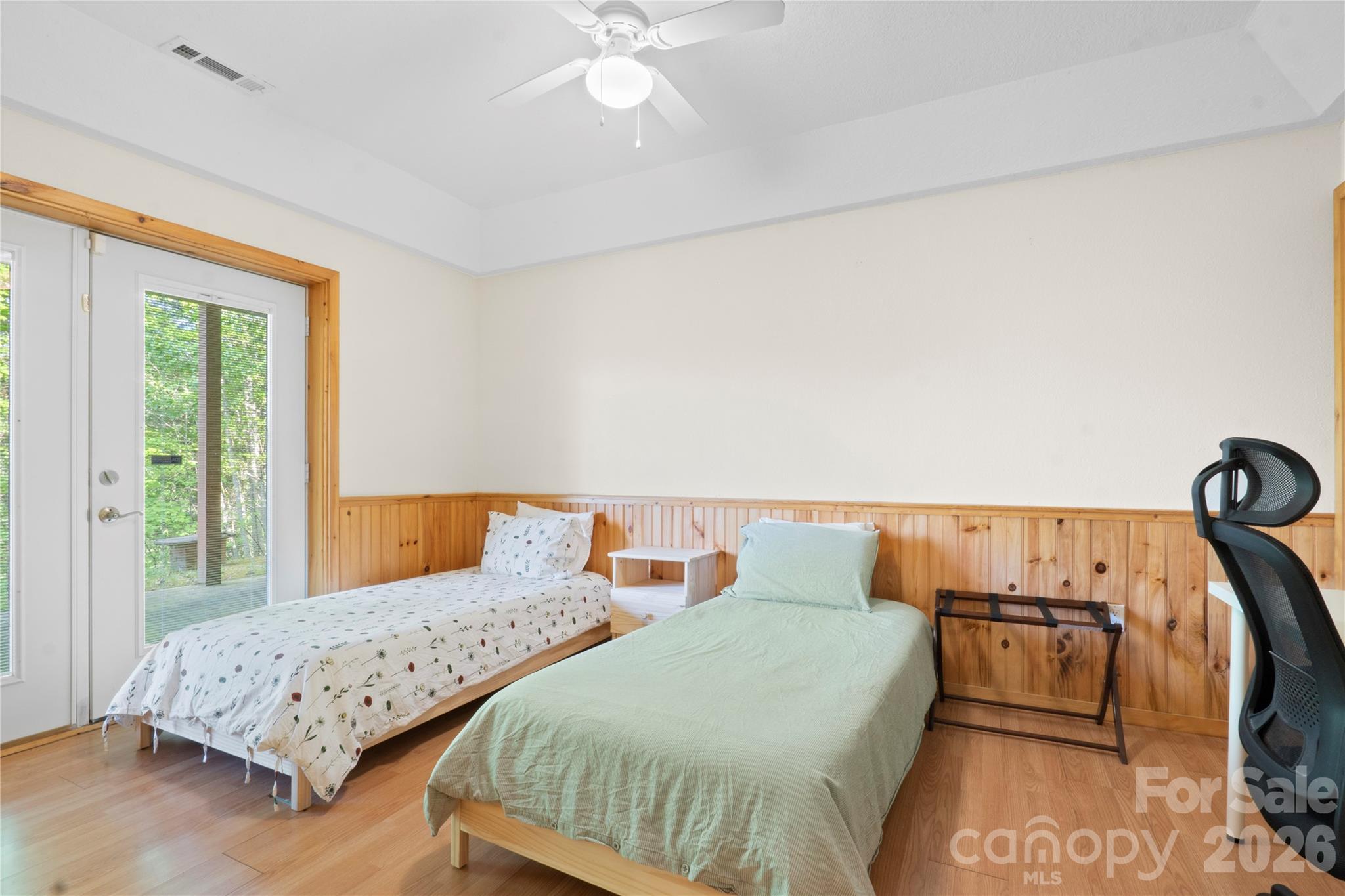 273 North Rhododendron Road Almond, NC 28702 - Photo 23 of 27 a bedroom with two beds and a window