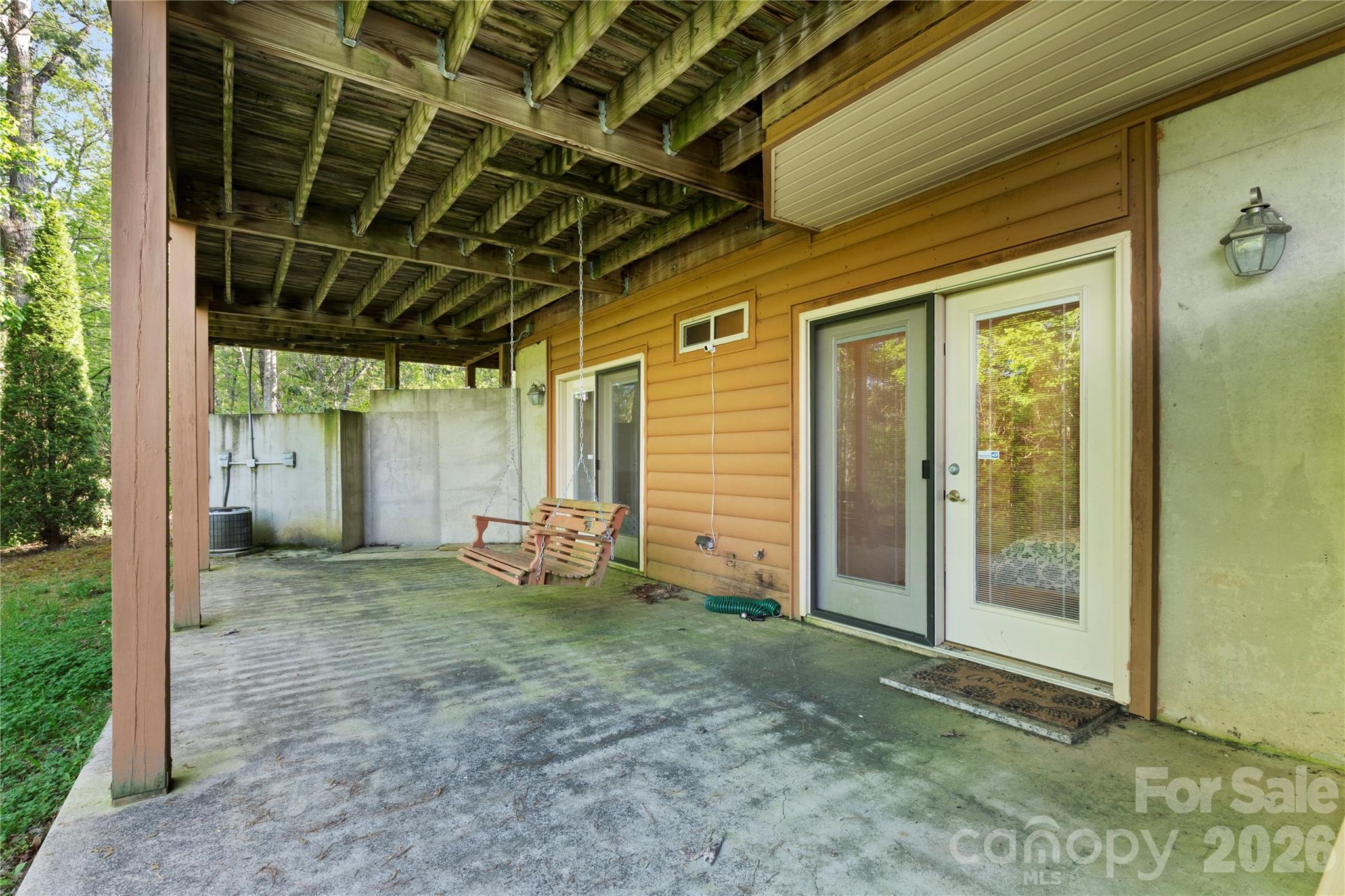 273 North Rhododendron Road Almond, NC 28702 - Photo 27 of 27 a view of a room with wooden floor and windows